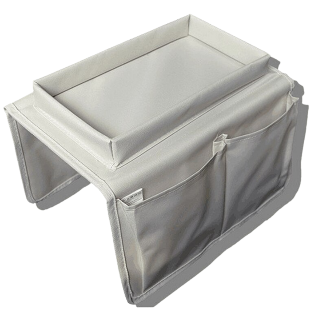 Bag hanging by the arm of the sofa